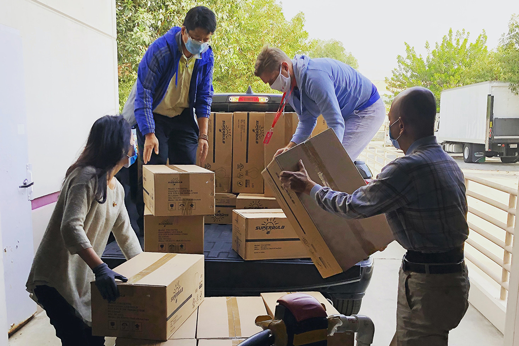 People moving boxes and streamlining their move.