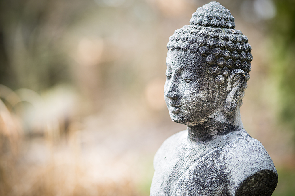 Cluttered space, cluttered mind. Buddha statue. Cluttered space, cluttered mind. Buddha statue.